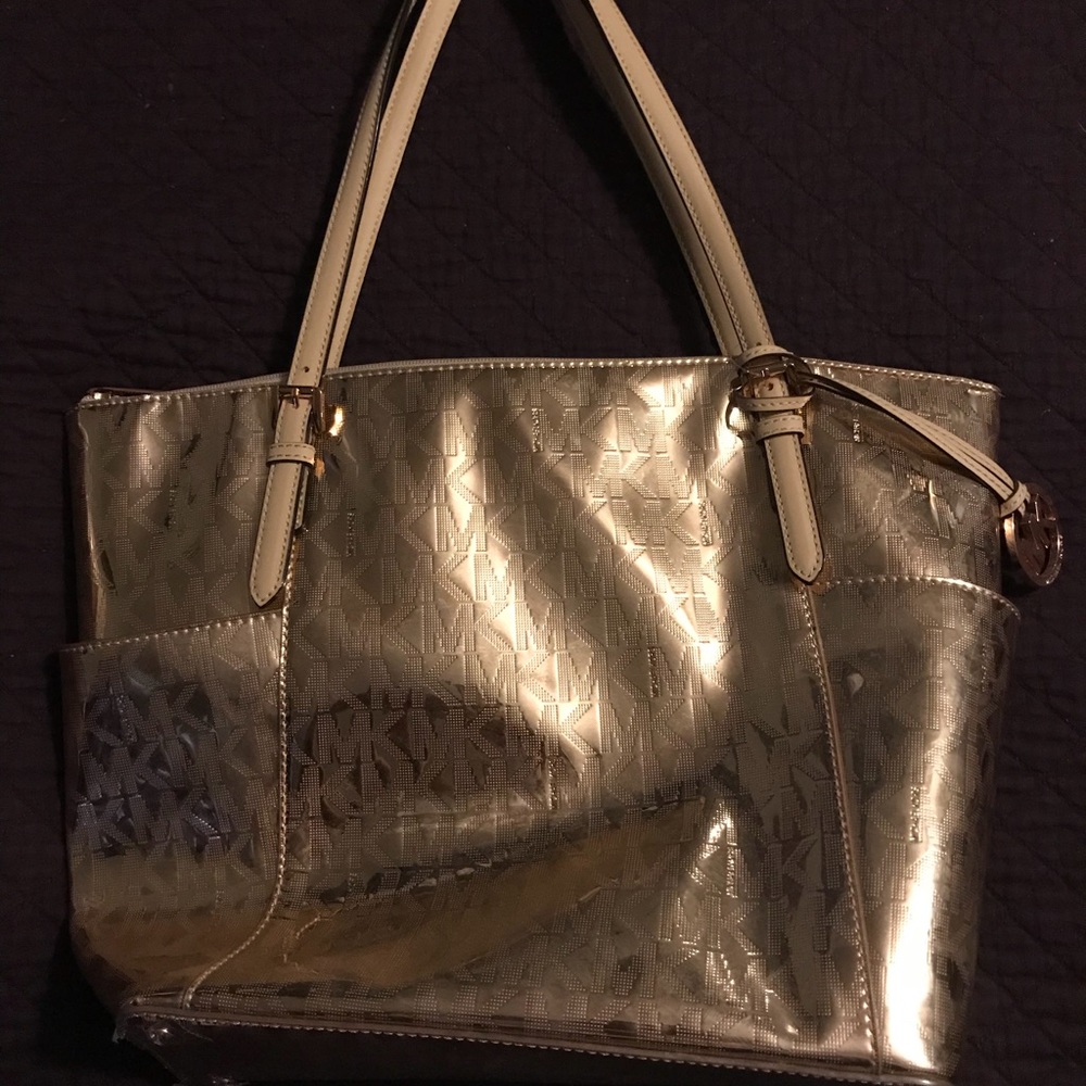 Authentic Michael Kors rose gold handbag